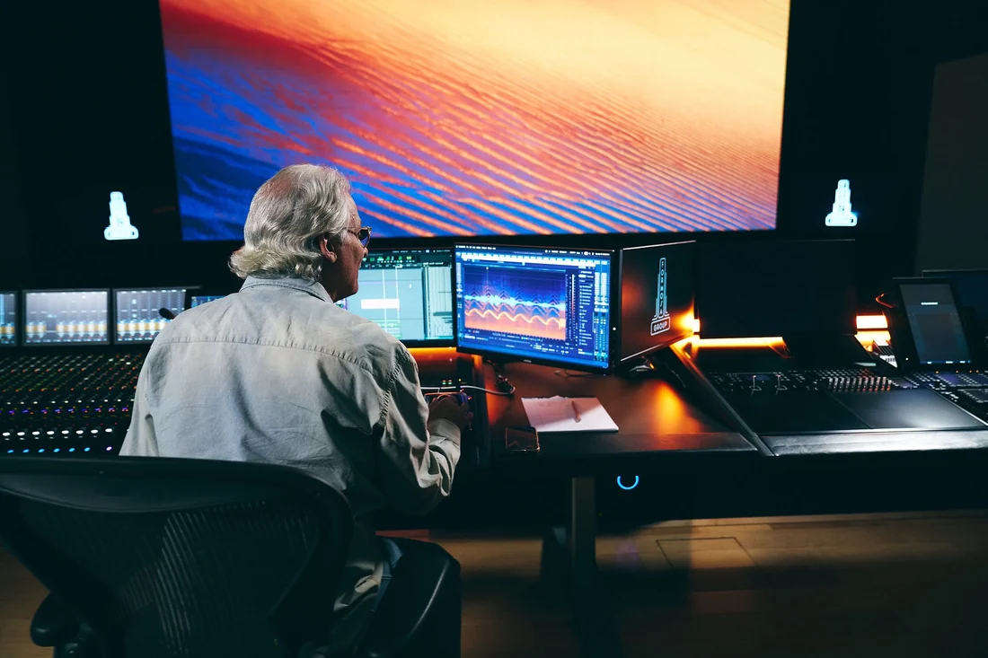 Visual for this record: Native Instruments and iZotope joined a shared group, not a merger